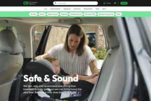 Woman putting child in car seat