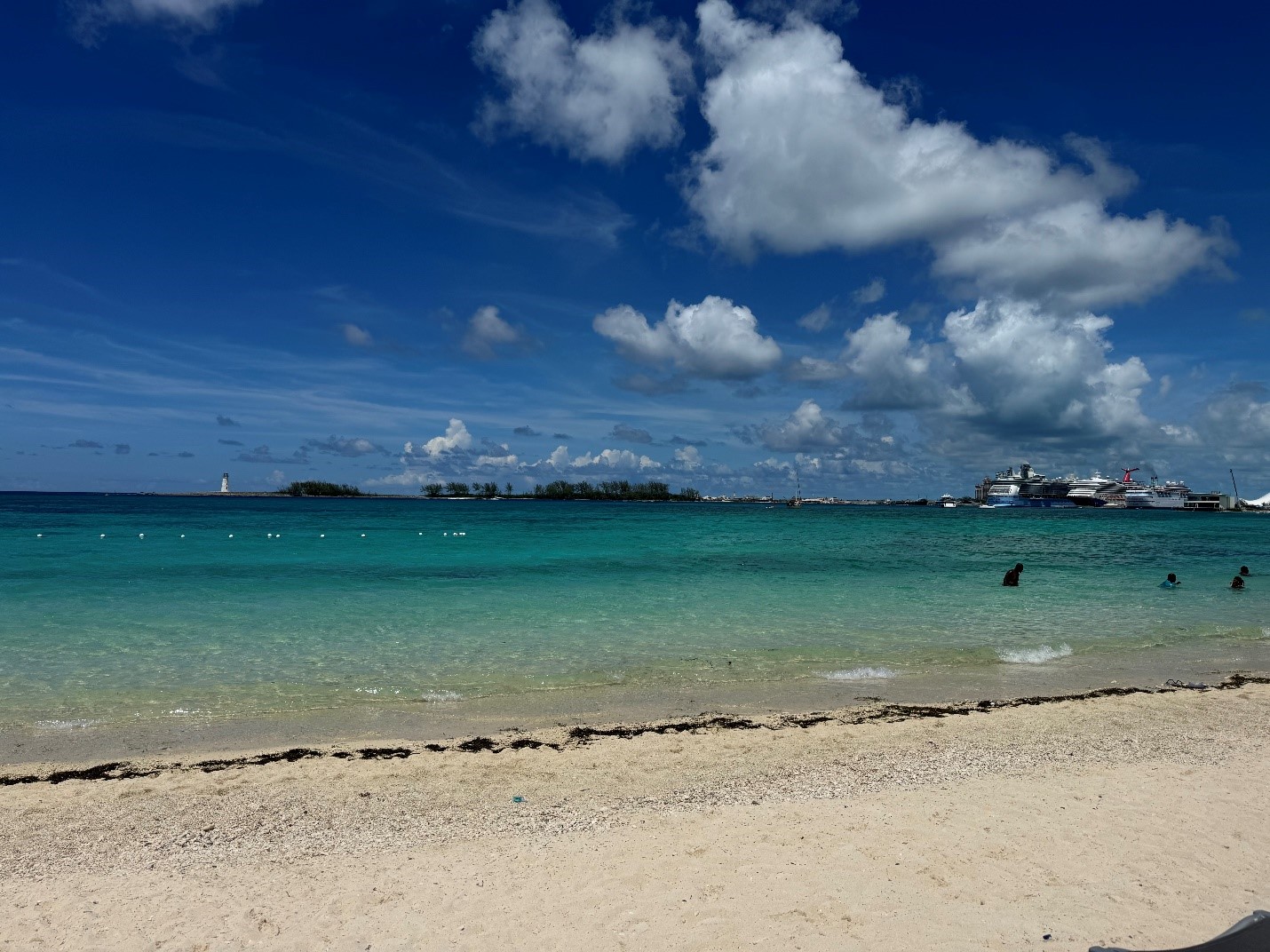 A beach with blue water and clouds

AI-generated content may be incorrect., Picture