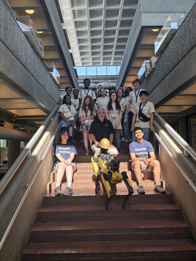 Pratham Rao mentoring a pre-college student during an AACE engineering session