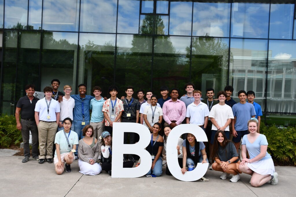 Pratham Rao leading an AACE outreach activity with pre-college students