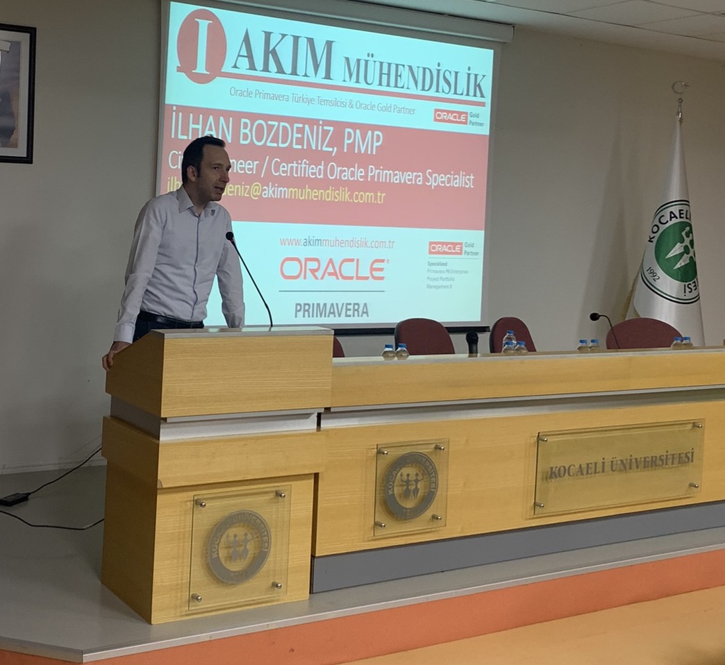 Ilhan Bozdeniz giving a speech to engineering students at a university symposium