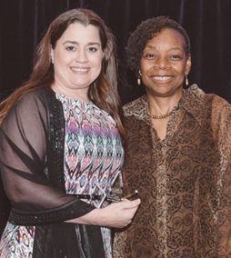 AAFCS 2017-18 President Jacqueline Holland, CFCS-HDFS, (right) presents Dawn Michaelson, (left) with the AAFCS Jewell L. Taylor Graduate Fellowship during the AAFCS 109th Annual Conference in Atlanta, Ga.