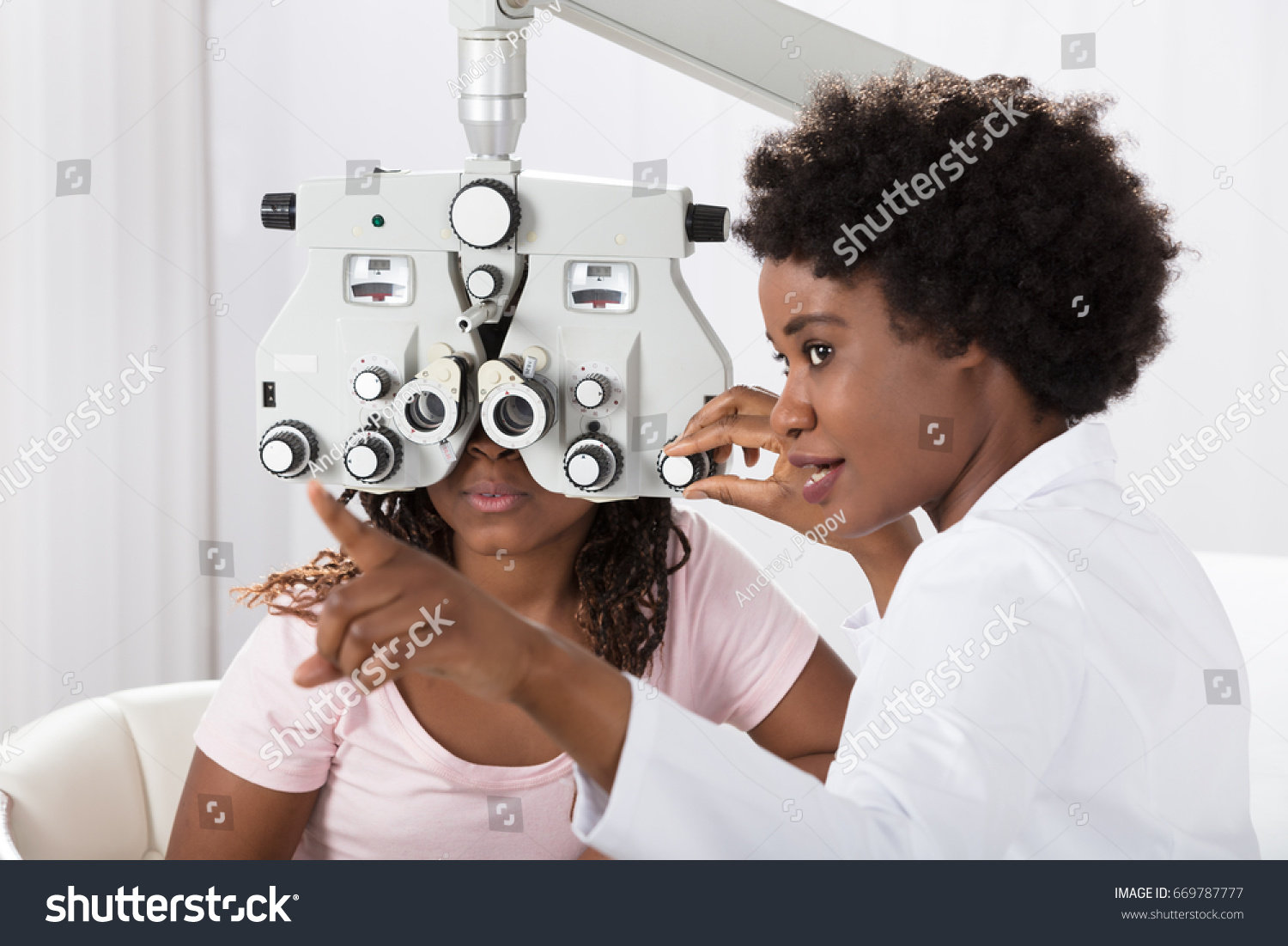 stock-photo-female-african-optometrist-doing-sight-testing-for-patient-in-hospital-669787777.jpg