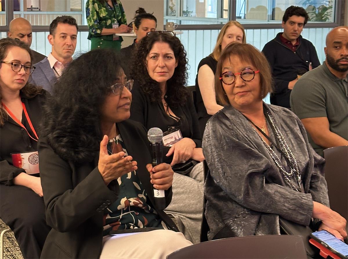 A 2025 ATC Summit attendee asks panelists a question.