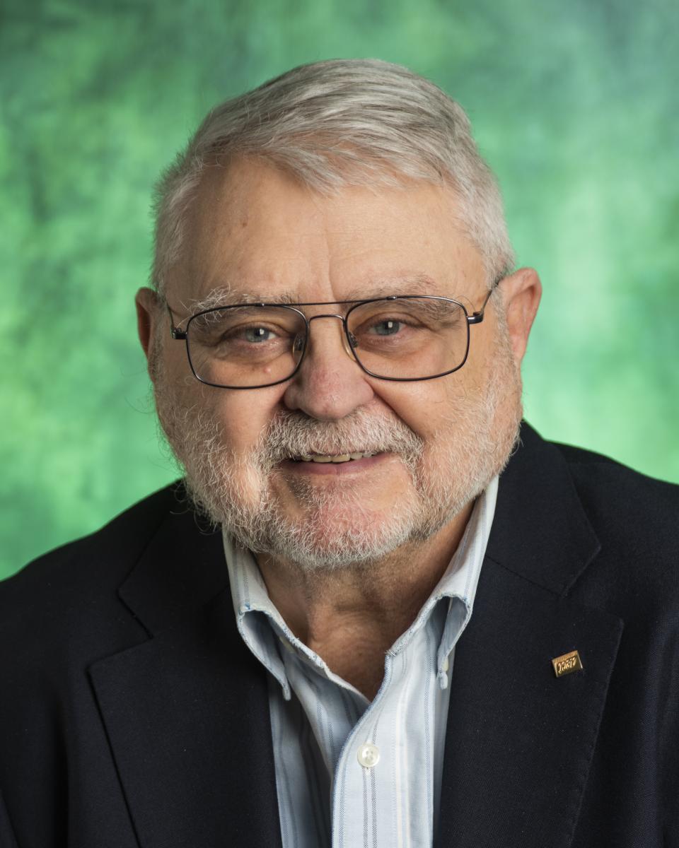 Dr. J. Michael Spector
