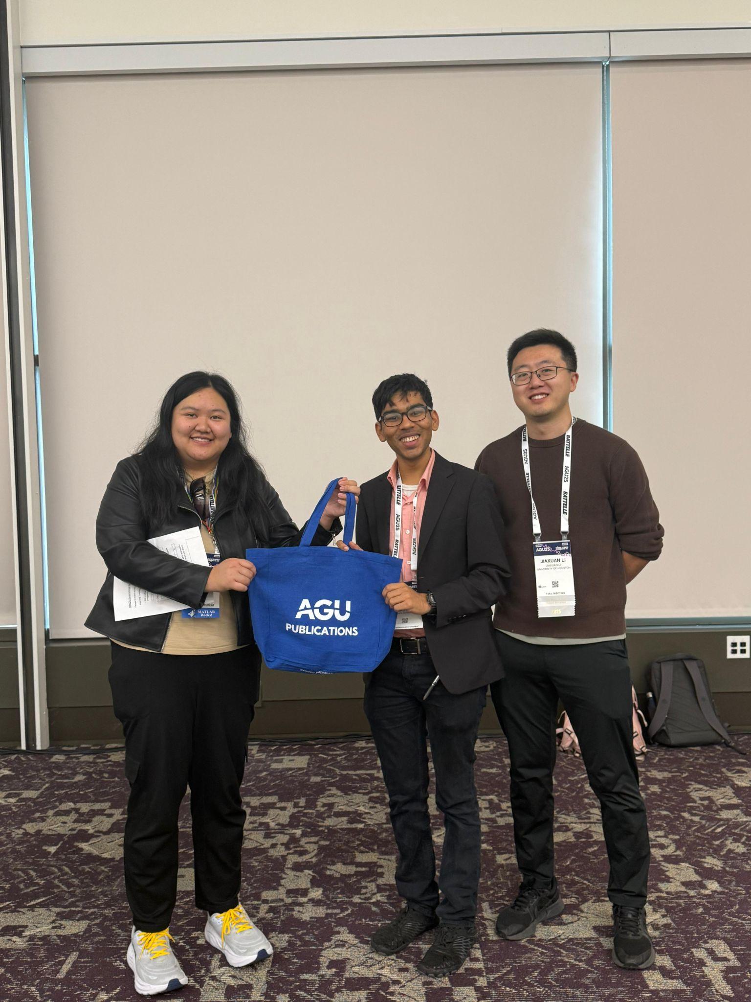 Winners of Seismo-Bingo receiving prizes at the AGU25 networking luncheon