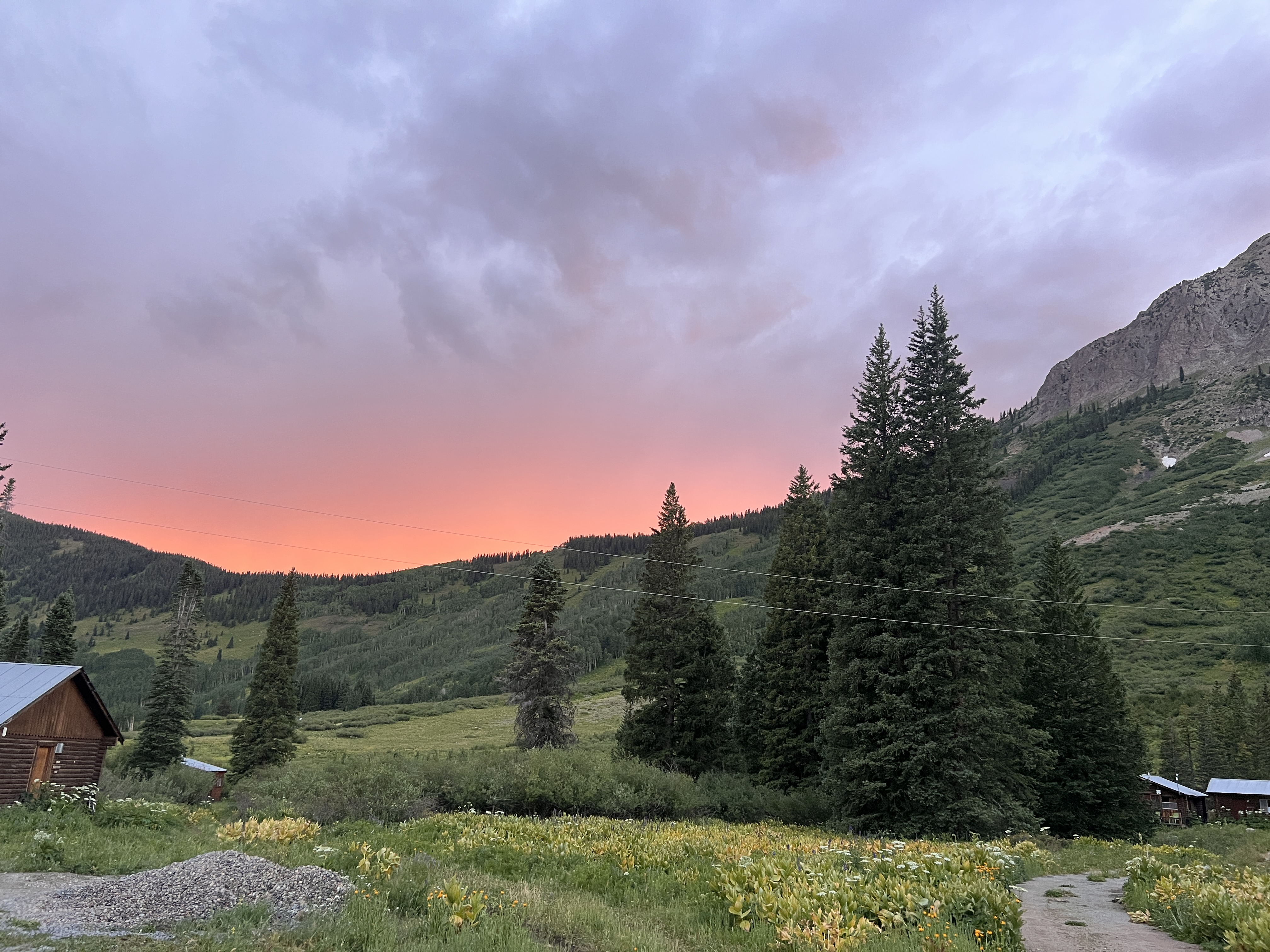View of colorful sunset at Rocky Mountain Biological Laboratory in Crested Butte, Colorado