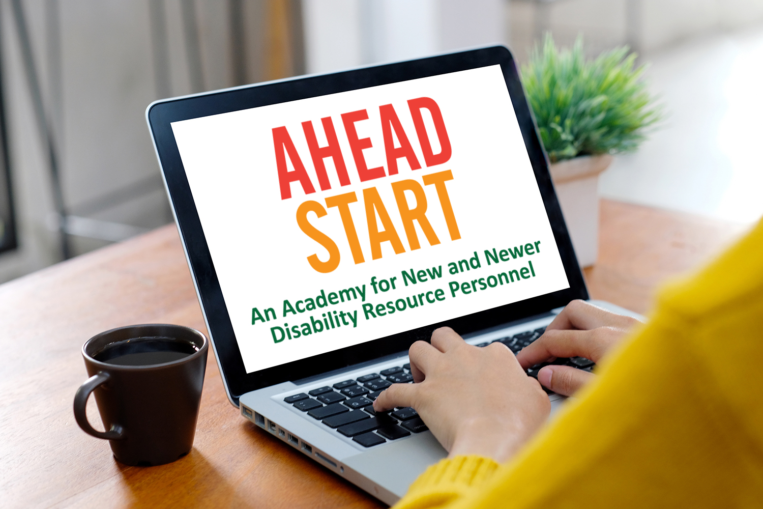 Laptop screen with the AHEAD Start conference logo