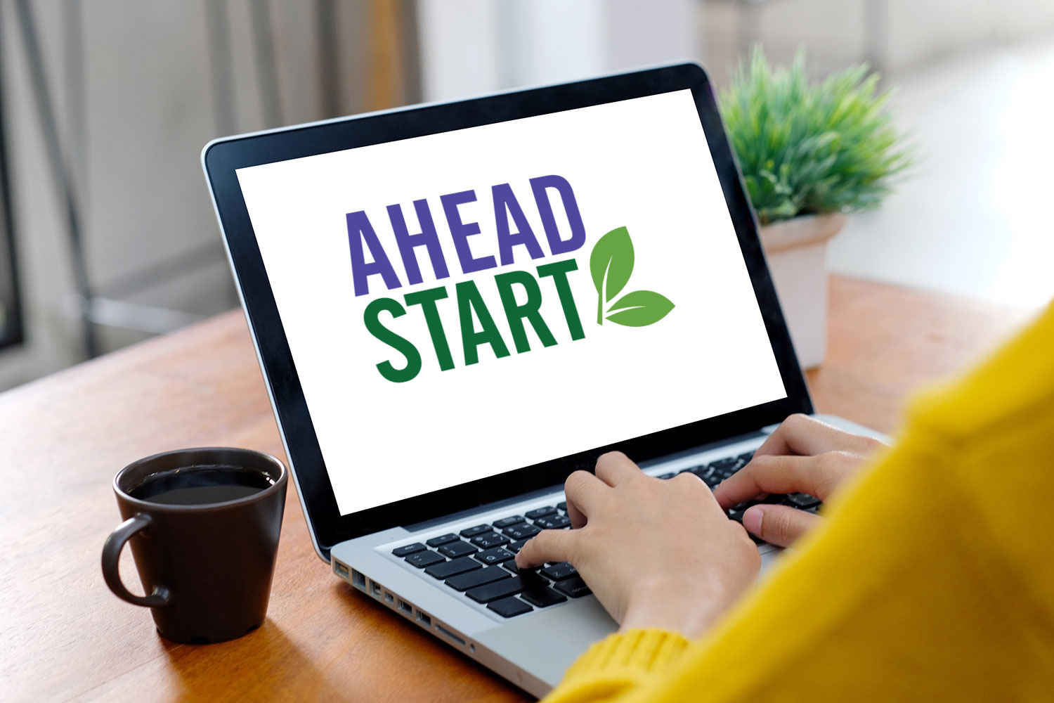 Laptop screen with the AHEAD Start conference logo