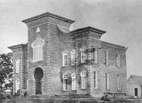 A black and white photo of a brick building

AI-generated content may be incorrect.