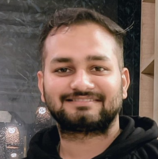 A person smiling for a picture

AI-generated content may be incorrect.