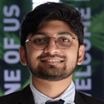 A person wearing glasses and a suit

AI-generated content may be incorrect.