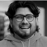 A person with glasses smiling

AI-generated content may be incorrect.