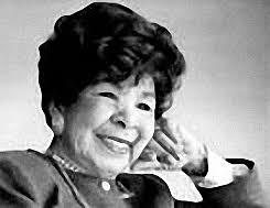 A person smiling with her hand on her head

AI-generated content may be incorrect.