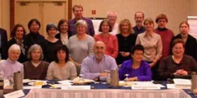 A group of people facing the camera, with Mitch Freedman in the center