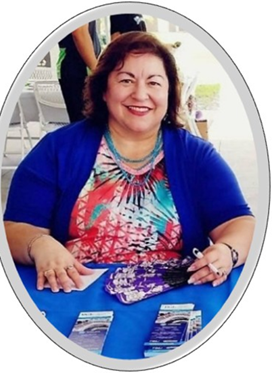 a woman smiling at a table