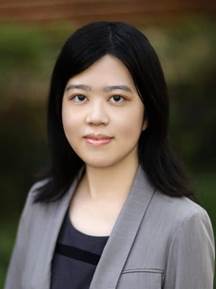 A person with dark hair wearing a grey suit jacket
AI-generated content may be incorrect.