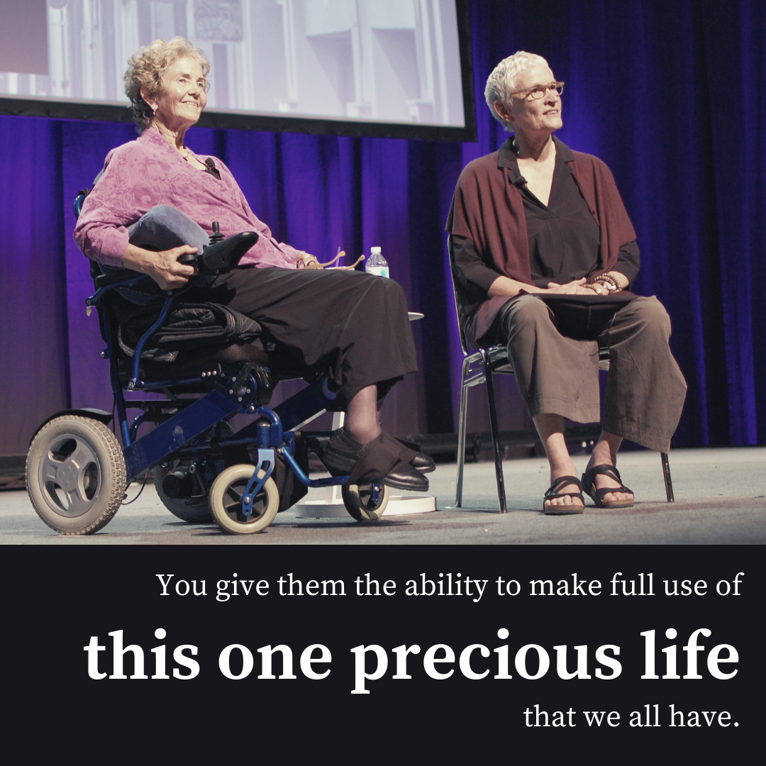 Dr. Grace Dammann and Fu Schroeder on the stage at AOTA's Annual Conference Welcome Ceremony. Text quote "You give them the ability to make full use of this one precious life that we all have