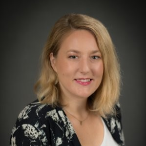 photo of a woman with blonde hair smiling