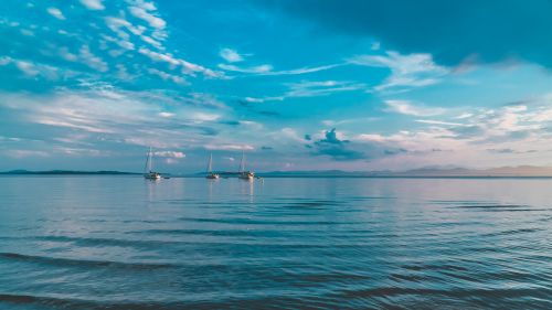 A sunset on a beach in the town of Burlington, VT Free to use under the Unsplash License by Pavel Brodsky