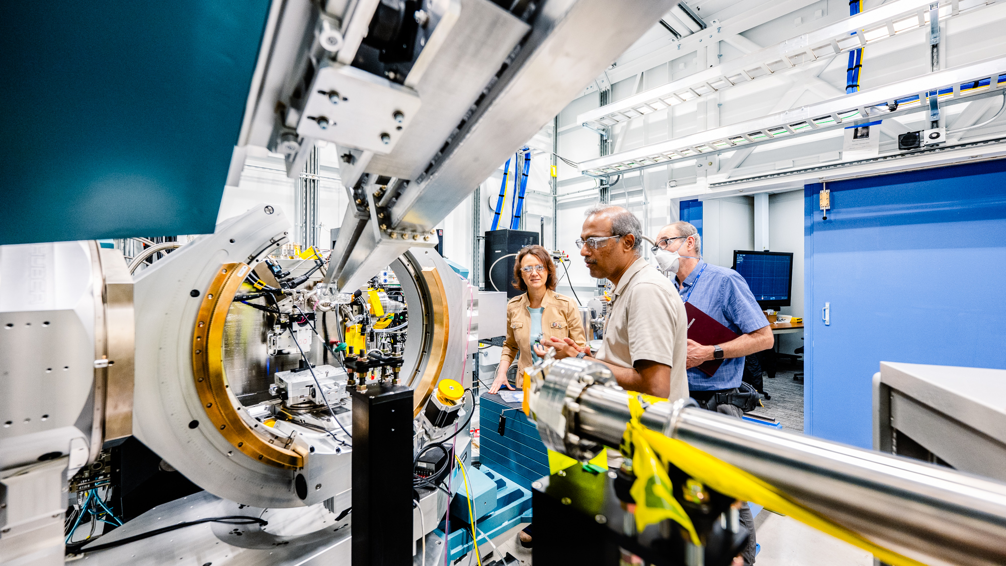 Figure 3: Members of the beamline staff work on new instrumentation for the X-ray Photon Correlation Spectroscopy (XPCS) beamline at the APS, one of seven new experiment stations to be constructed as part of the APS Upgrade Project. Photo by Jason Creps, Argonne. 