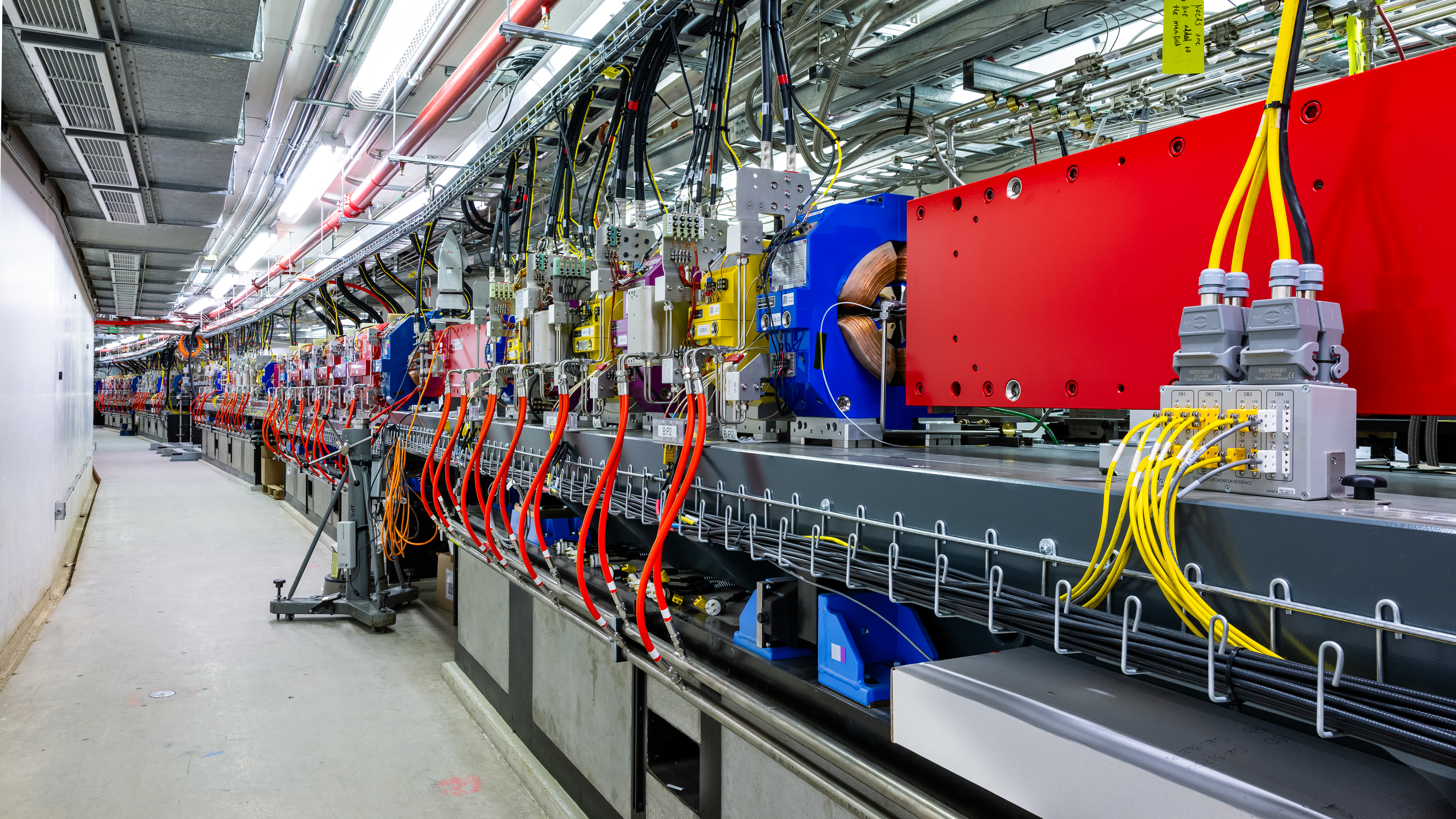 Figure 2: The new APS electron storage ring spans more than 2/3 of a mile and includes 1,321 individually-powered magnets that are aligned to a precision of about 30 microns. Photo by Mark Lopez, Argonne.