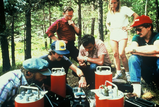 U.S. Seismologists with portable seismometers on a granite outcrop near Kakarolinsk, Kazakhstan, about 200 km from the Soviet test site, July 1986. Tom Cochran at the right. (Thomas Cochran)