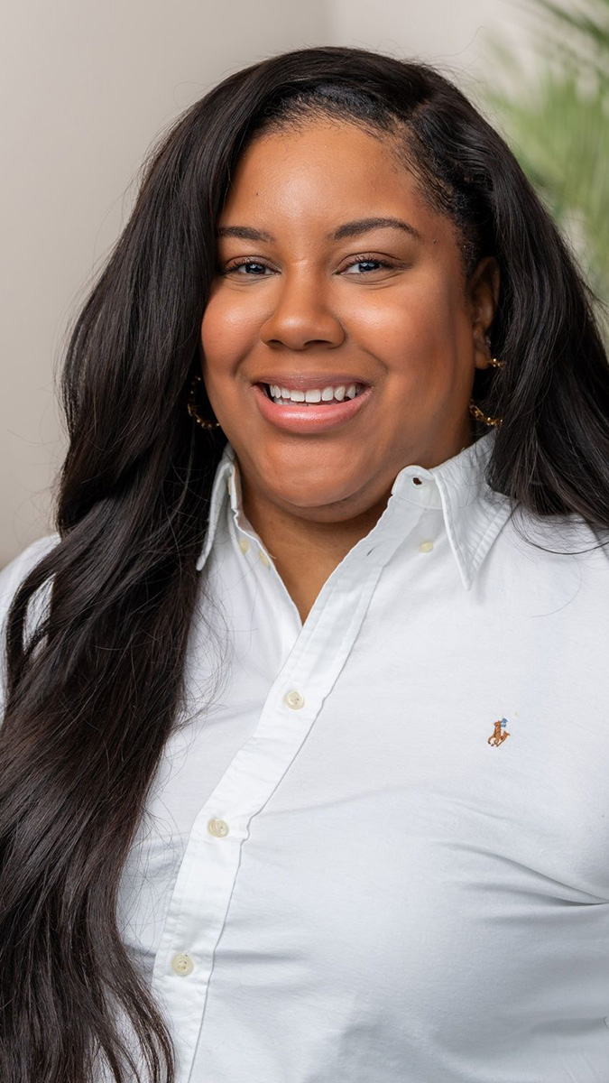 Headshot of Elisa Auguste, CASC