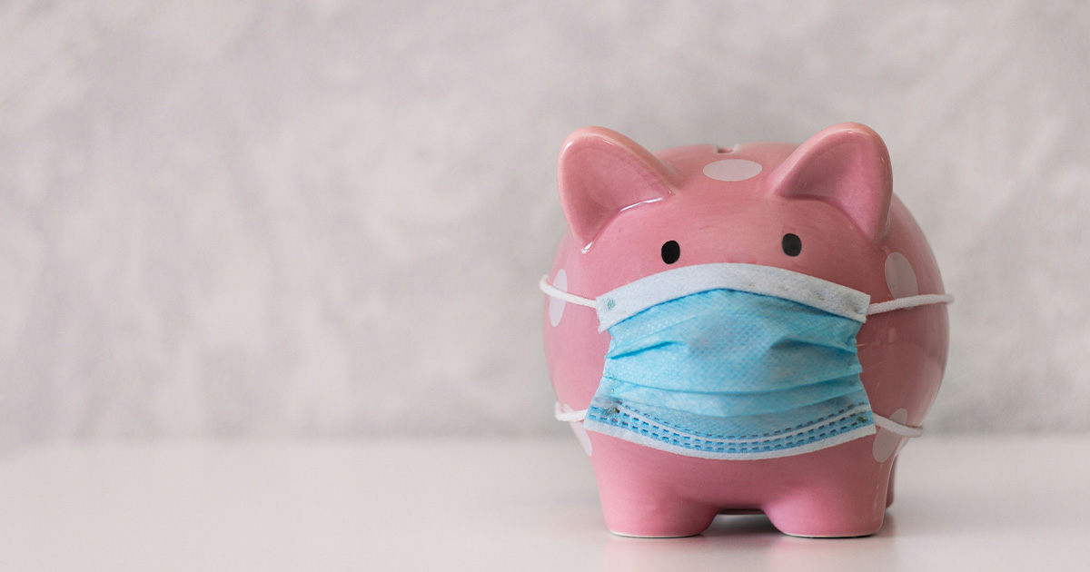 Pink piggy bank wearing a surgical mask symbolizing cost savings strategies for ambulatory surgery centers and orthopedic implant procurement