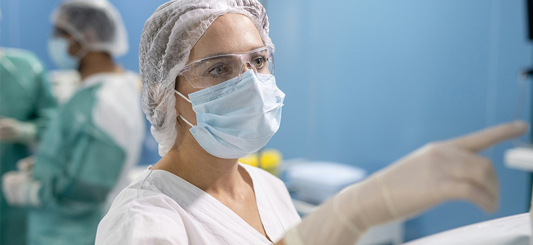 A medical professional in PPE.