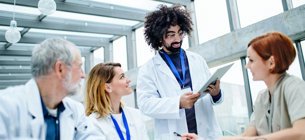 Medical professionals around a table.