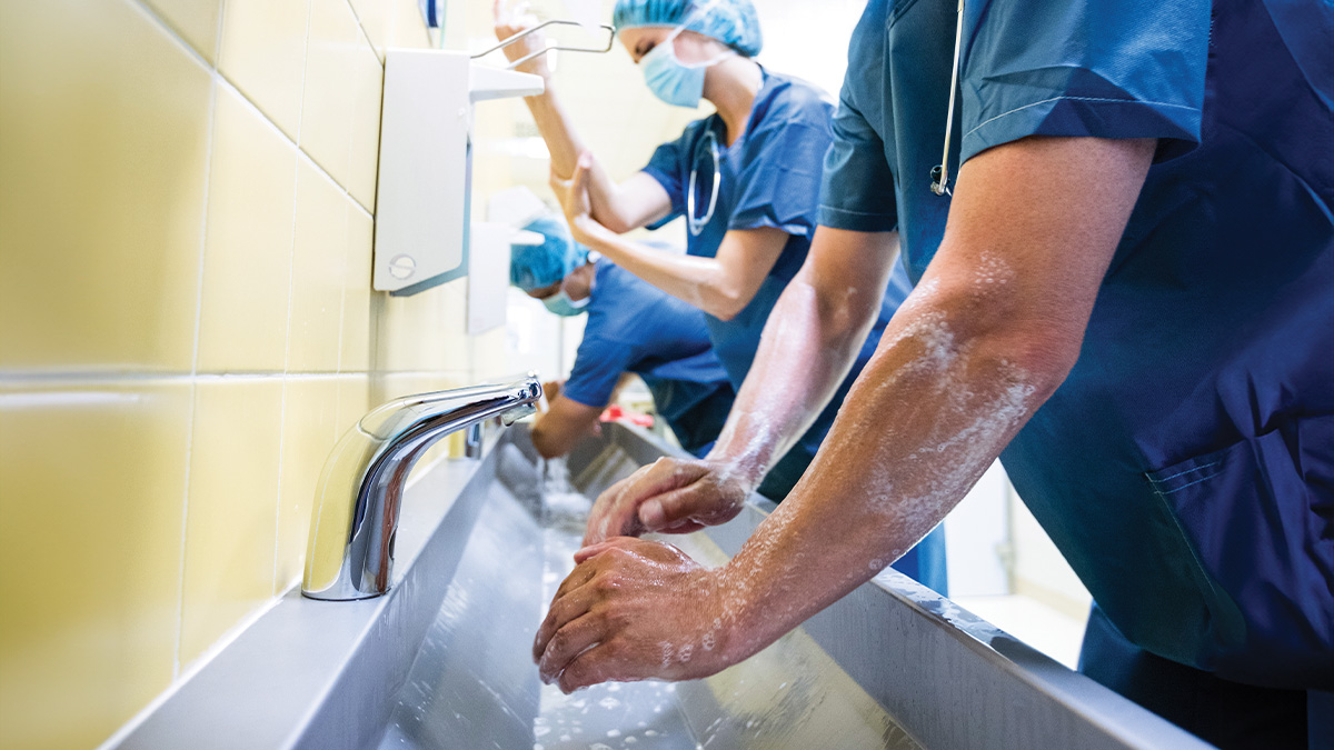 Physicians washing their hands.