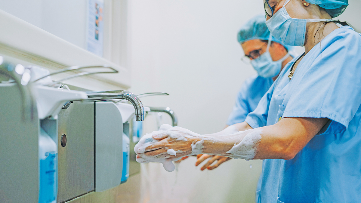 Surgeons washing their hands.