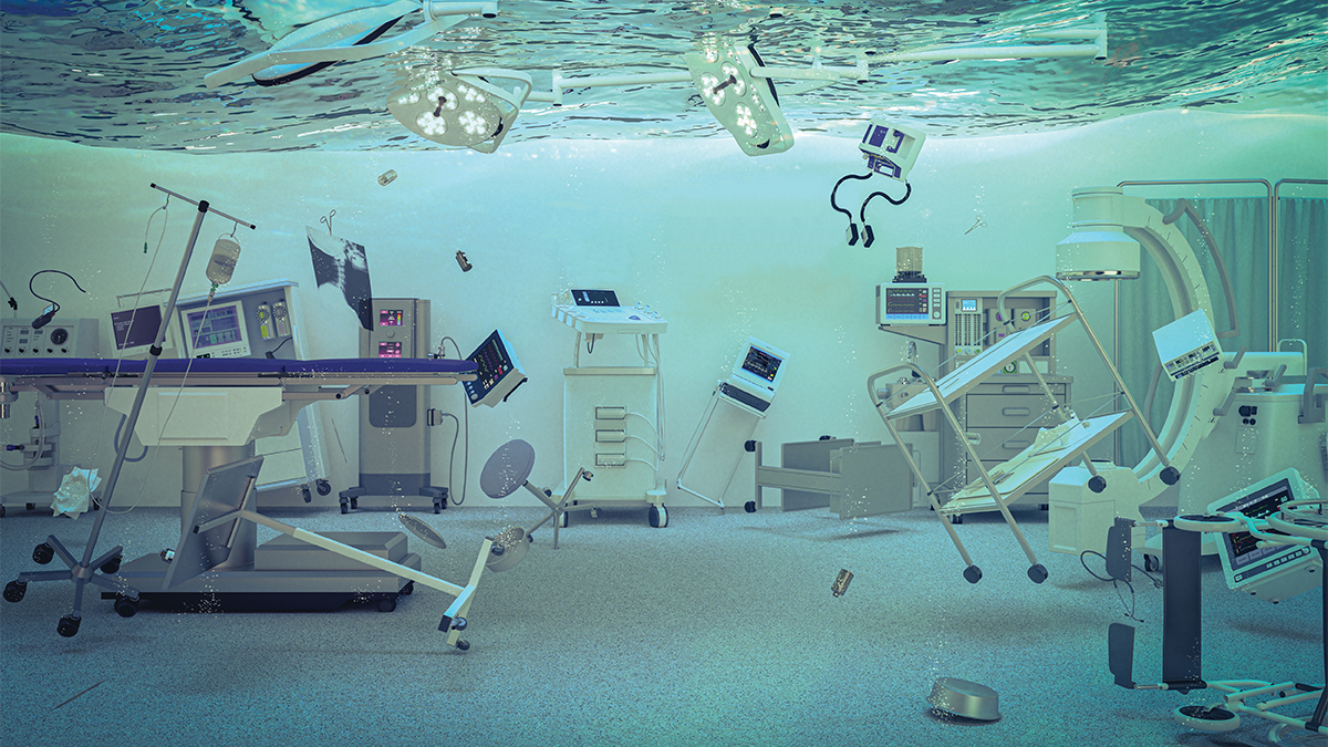 An ASC operating room filled with water and medical items floating around.