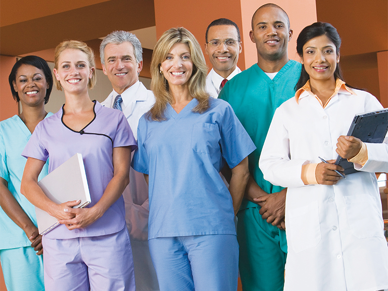 Medical professionals posing for a photo.