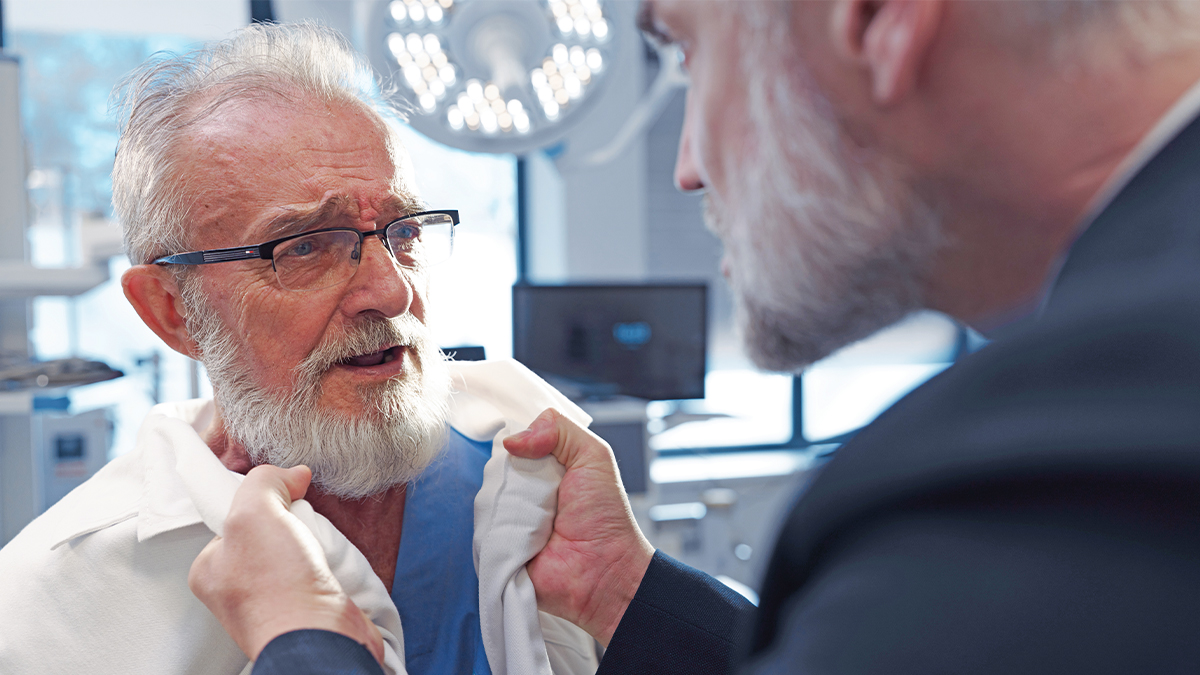 A man bullying a medical professional.
