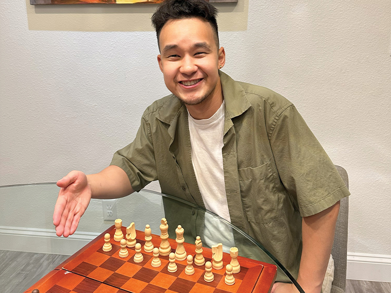 Joseph inviting us to play chess.