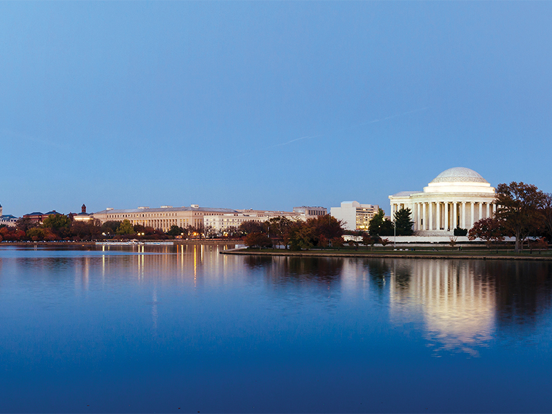 The Jefferson Memorial and its reflection in the Tidal Basin at dusk in Washington, DC.