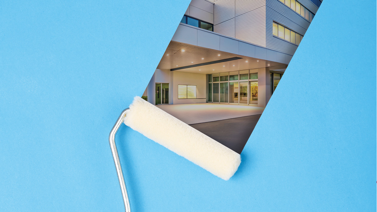 A paint roller peels back a blue background to reveal a modern ASC building exterior and entrance.