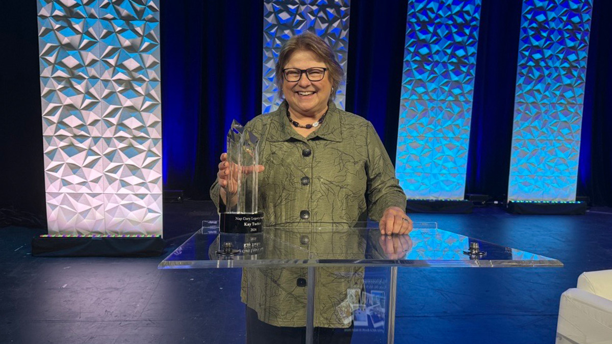 Kay Tucker recieves the Nap Gary Award during the ASCA + SAMBA 2026 Conference & Expo.