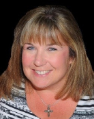 A close-up of a person smiling

AI-generated content may be incorrect.