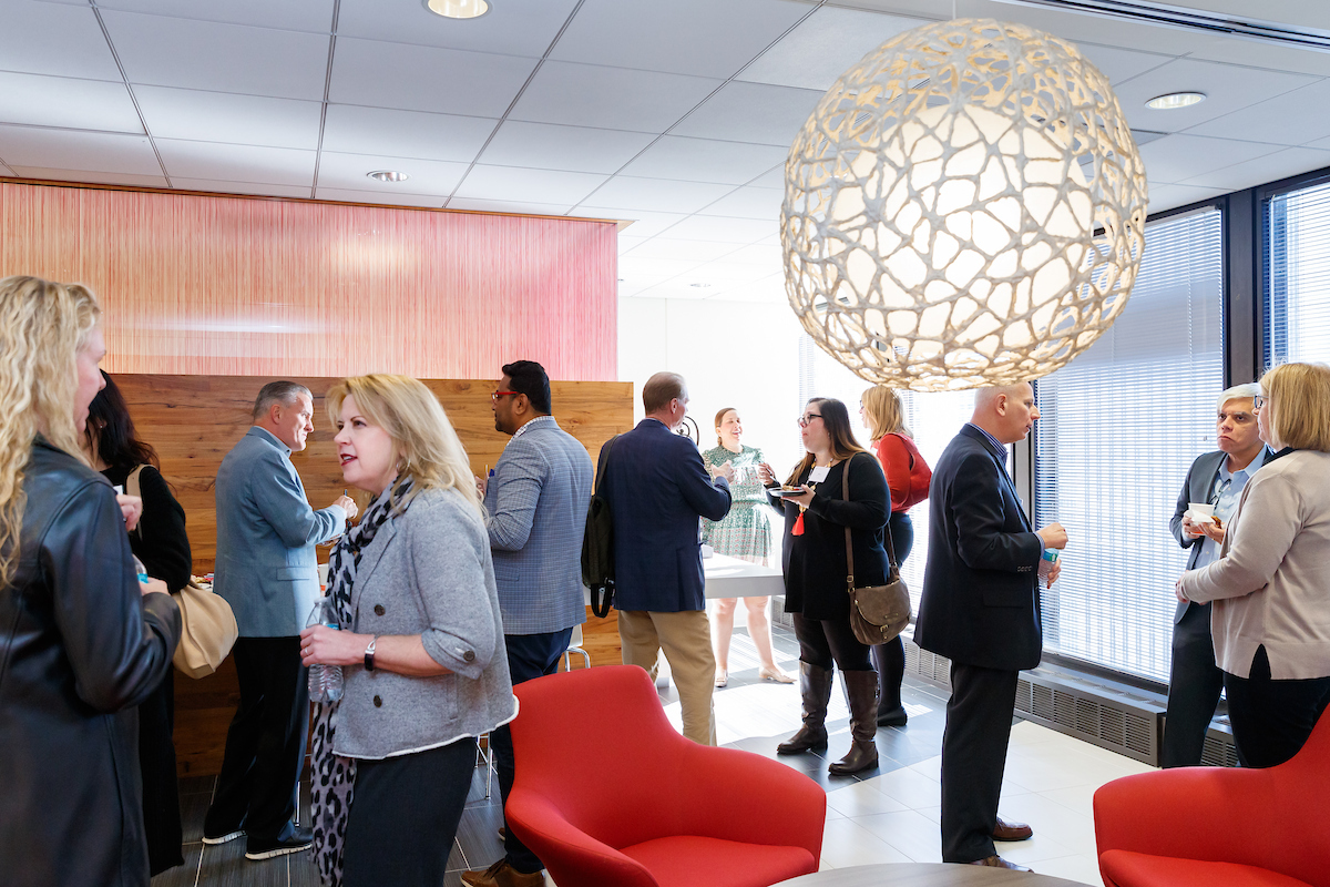 Association Forum members gathering in conversation