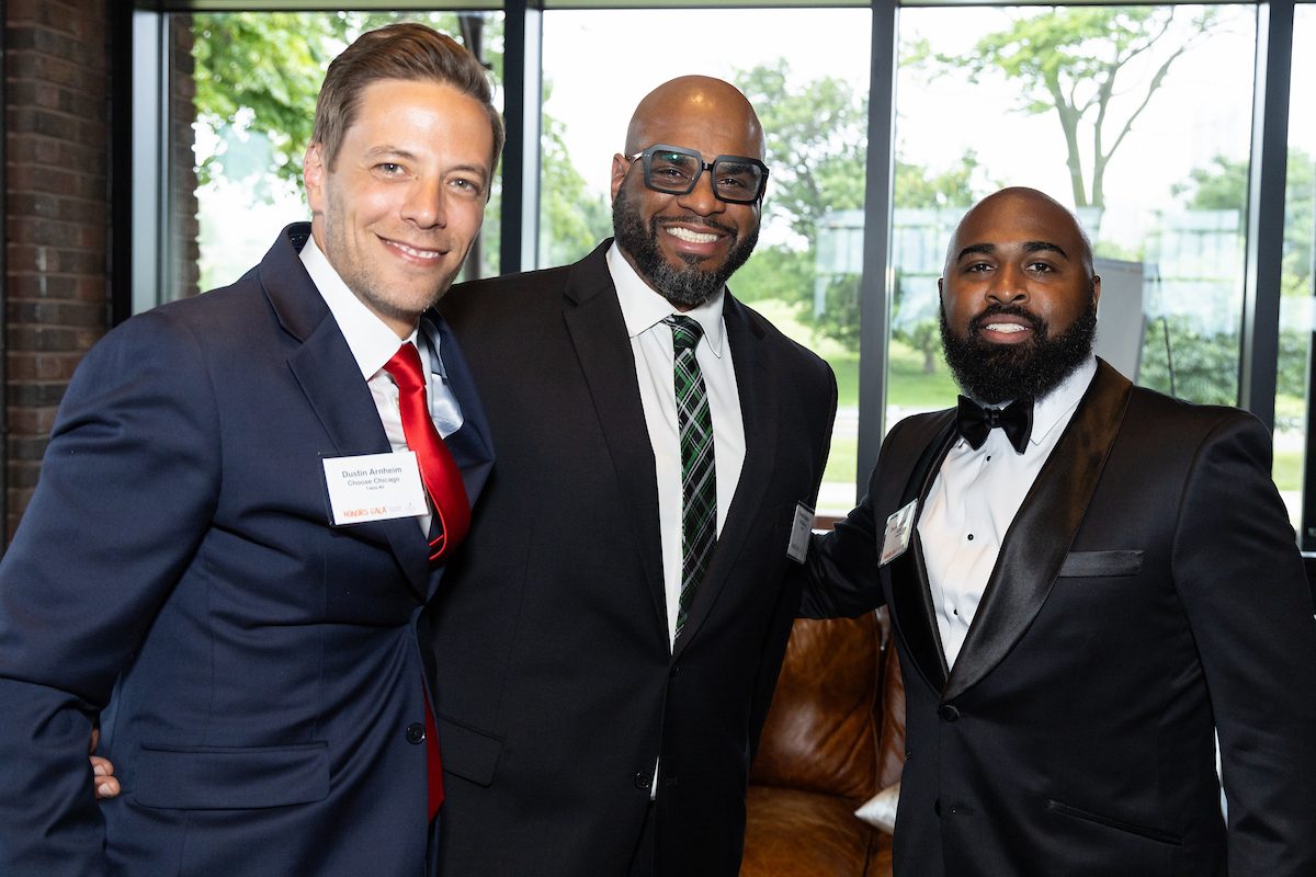 Three Association Forum members at the Honors Gala