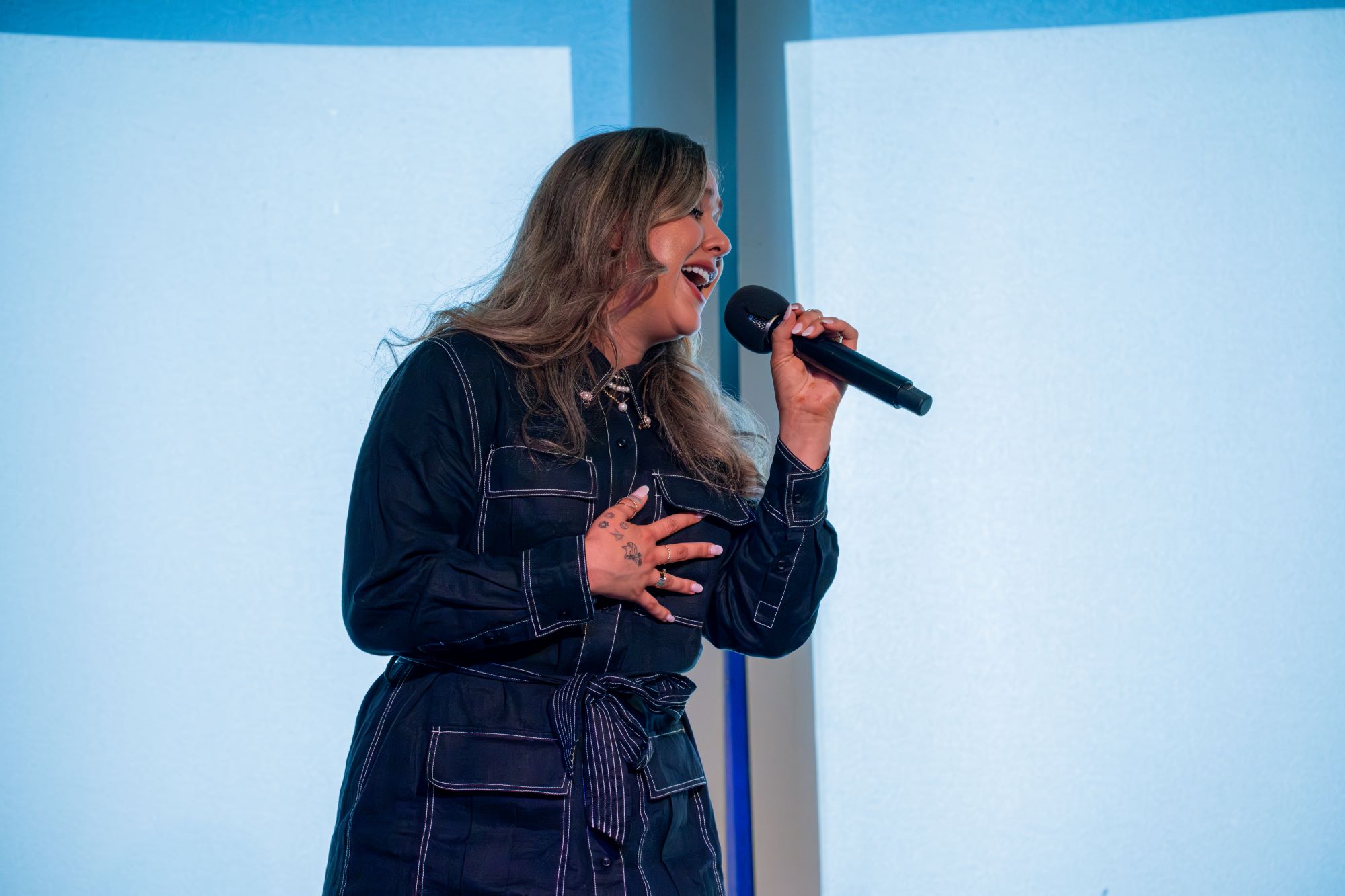 Alex Hosking singing at the CBAA Conference 2024