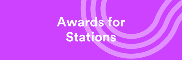 The words Awards for Stations on a purple background