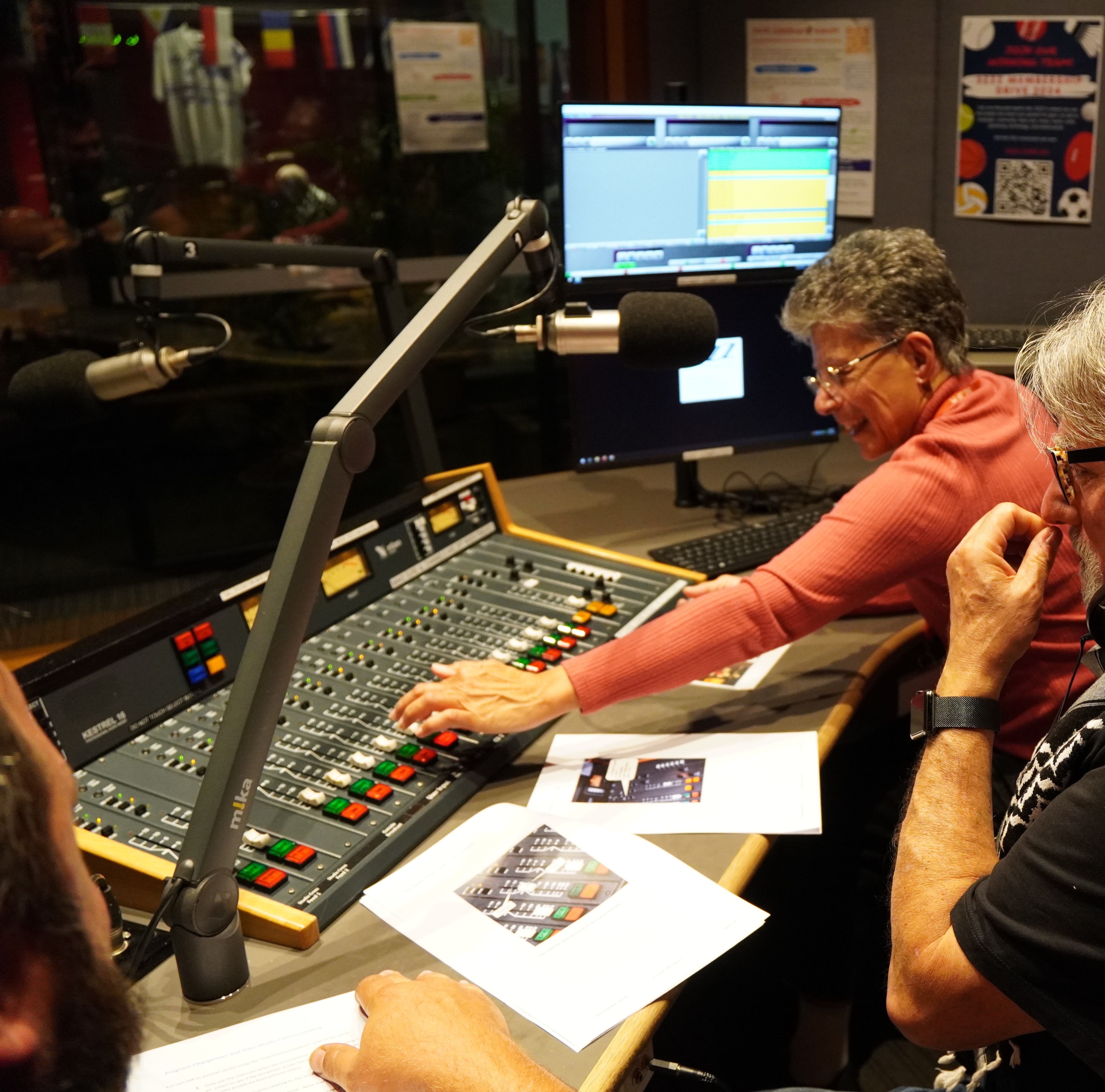 Volunteer using the radio panel at 3ZZZ