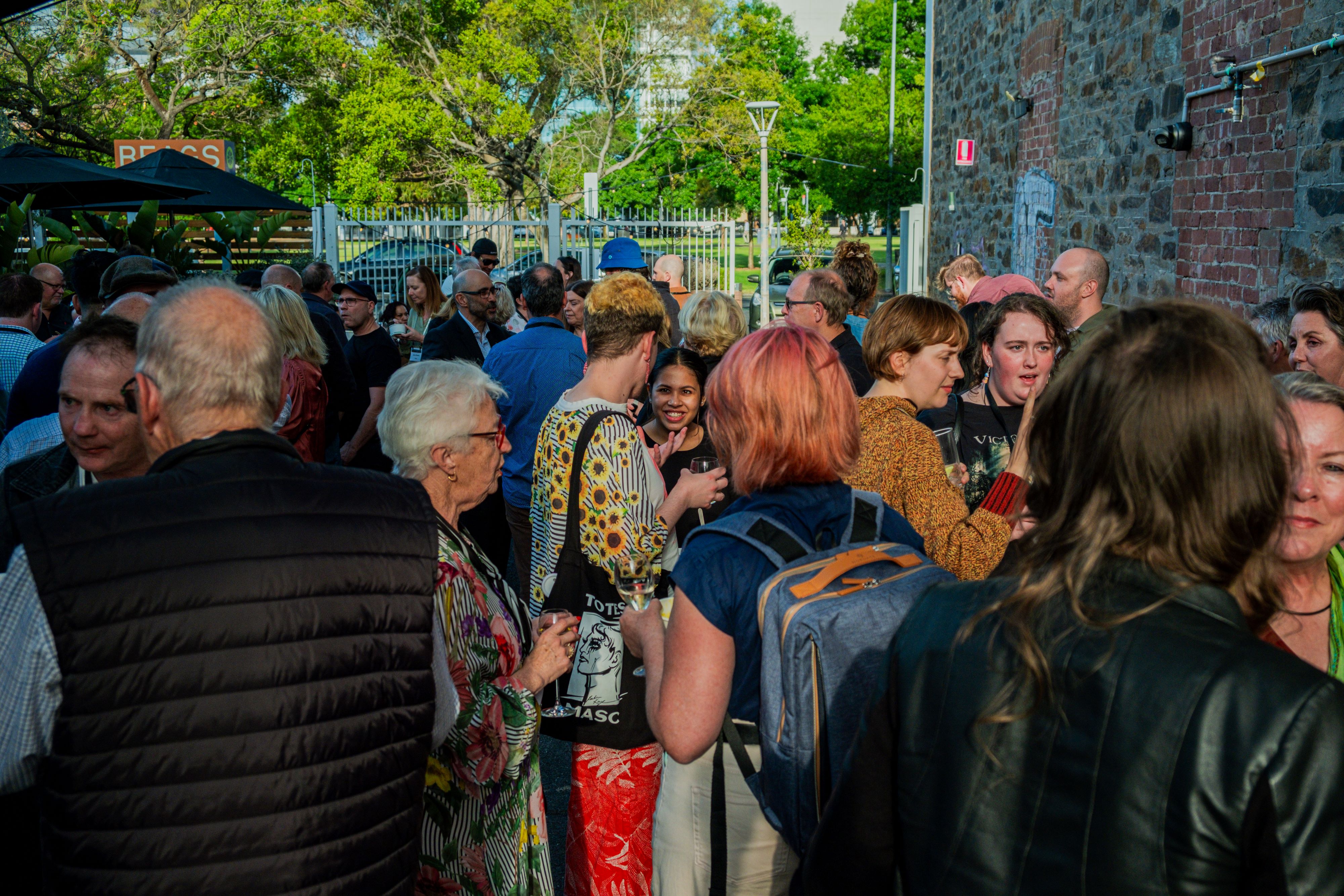 Crowd of people at the CBAA Conference 2023 Welcome Drinks