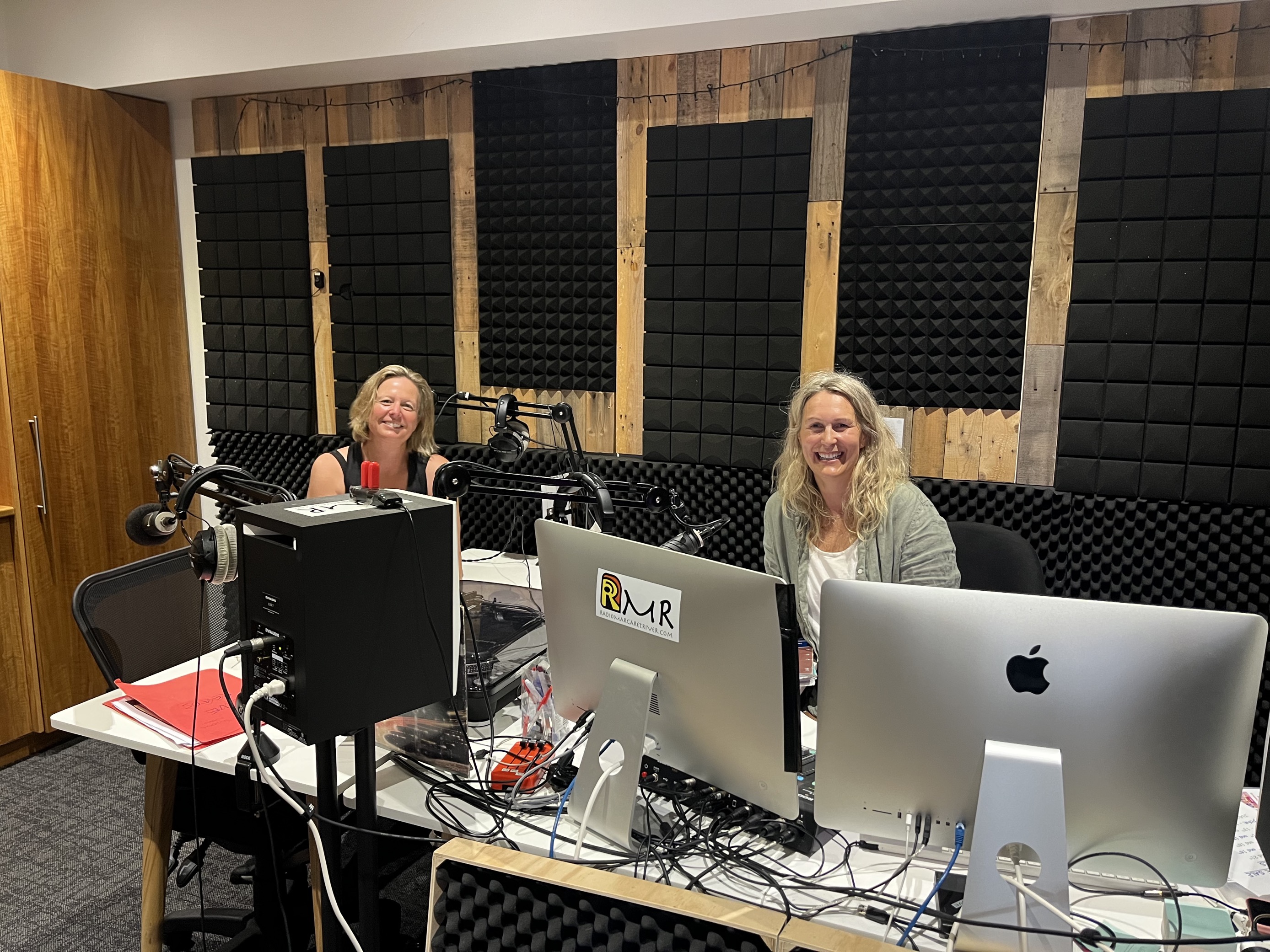 Two women behind a studio desk at Radio Margaret River