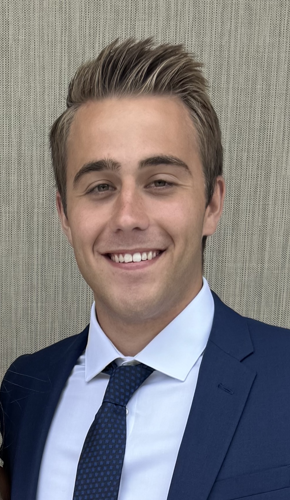 Blonde male in business suit