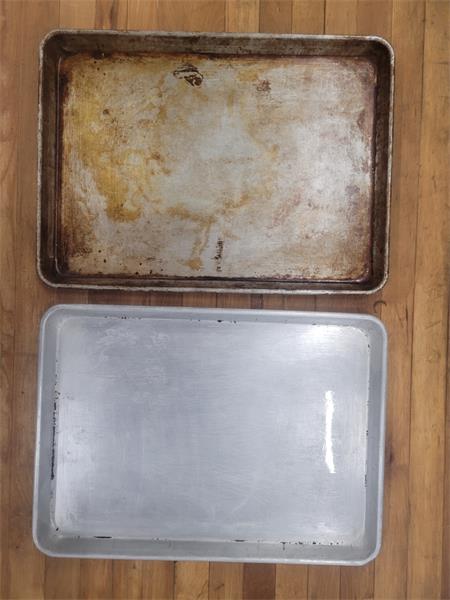 Cleaning Sheet Pans with the FOG Tank Sheet Pans cleaned with the Fog Tank - Before and After